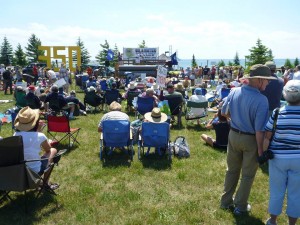People gather at the Oil & Water Don't Mix Rally on July 14 to draw attention to the 60-year old Enbridge Line 5 pipeline, currently being expanded to carry more tar sands oil. This pipeline is literally hanging in the Great Lakes and a spill would be catastrophic for communities who rely on these lakes for water.