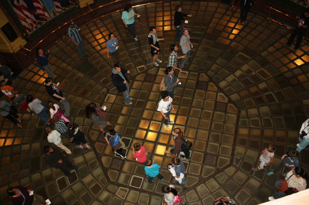 Flash mob in the Michigan Capitol Rotunda. A line of students on a field trip crossed us as we sang.